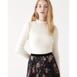 ジルスチュアート(JILLSTUART)のjillstuart フリルリブタートルニット(ニット/セーター)