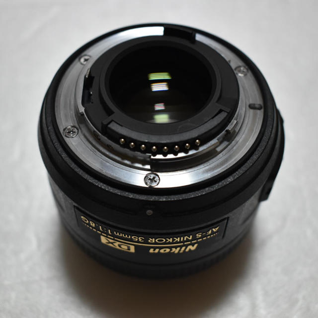 Nikon(ニコン)の美品 Nikon ニコン AF-S  DX 35mm f/1.8G フィルタ付き スマホ/家電/カメラのカメラ(レンズ(単焦点))の商品写真