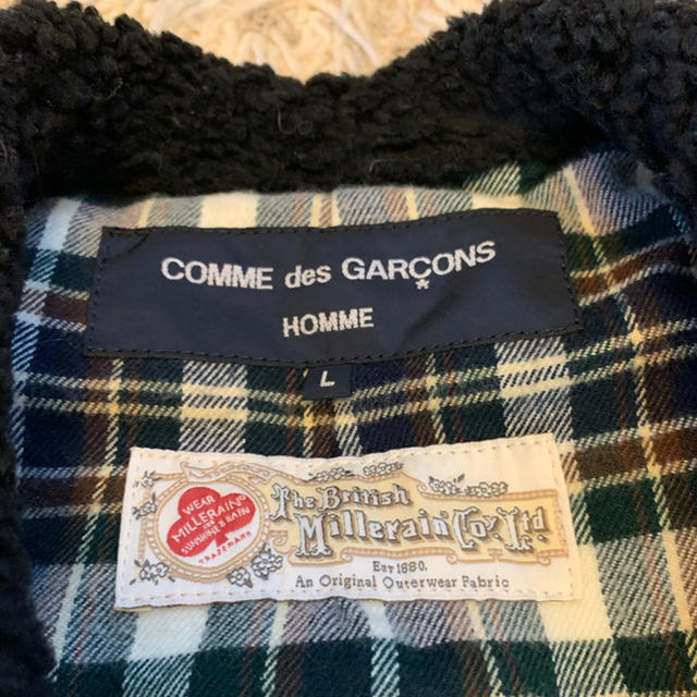 COMME des GARCONS(コムデギャルソン)のコムデギャルソンのダウンベスト メンズのジャケット/アウター(ダウンジャケット)の商品写真