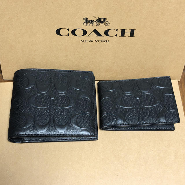 折り財布コーチ新品　エンボス加工　ブラック　黒　二つ折り財布