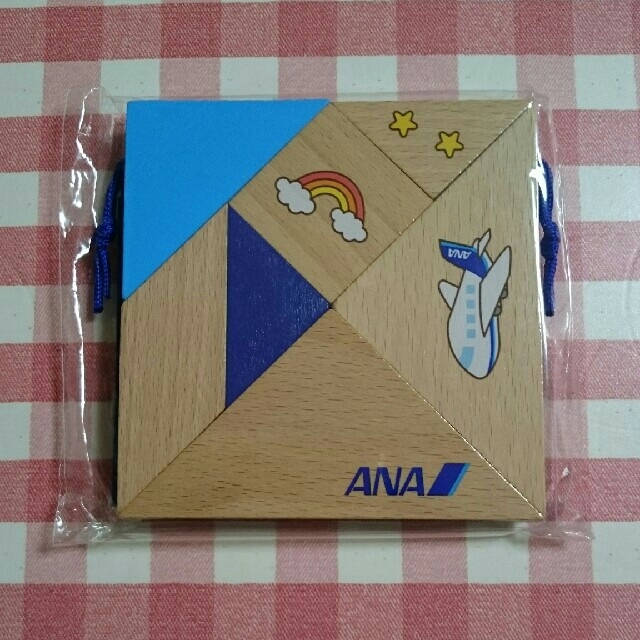 ANA(全日本空輸)(エーエヌエー(ゼンニッポンクウユ))のANA 木製脳育タングラム パズル おもちゃ キッズ/ベビー/マタニティのおもちゃ(知育玩具)の商品写真