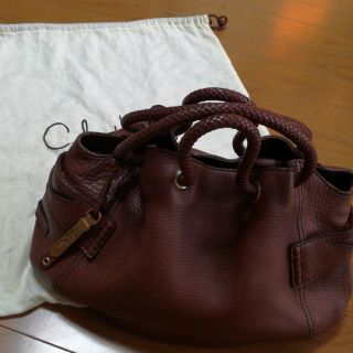 コールハーン(Cole Haan)のCole Haan 濃いブラウン　丸っこいバッグ(ハンドバッグ)