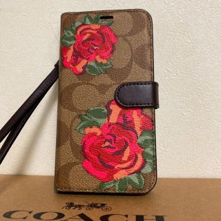 コーチ(COACH)の新品‼️ COACH   花柄  iPhone X/Xs 手帳型ケース(モバイルケース/カバー)