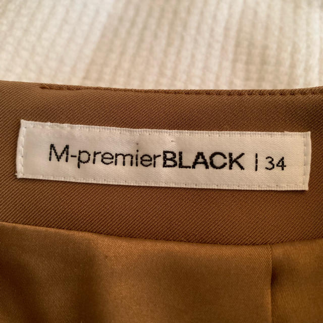 M-premier(エムプルミエ)のM-premier BLACK キャメルスカート レディースのスカート(ひざ丈スカート)の商品写真