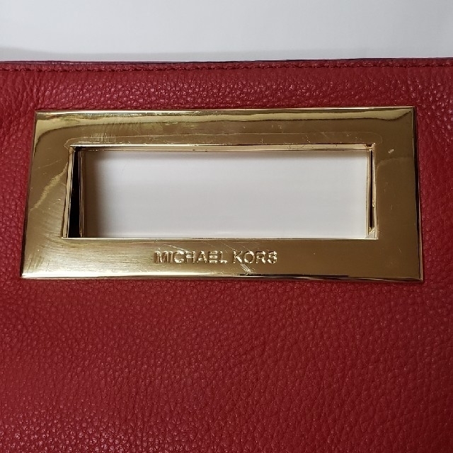 Michael Kors(マイケルコース)の値下げマイケルコース　クラッチハンドバック　ゴールド×レッド　美品 レディースのバッグ(クラッチバッグ)の商品写真