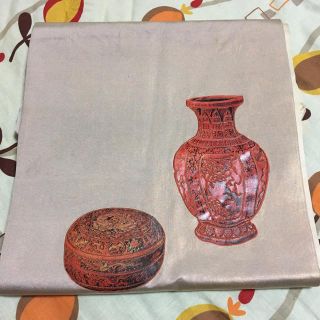 壺と入れ物の柄 ピンク系の玉虫色 名古屋帯