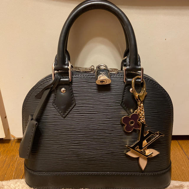 Shop Louis Vuitton Speedy monogram bag charm (M00544, M00995