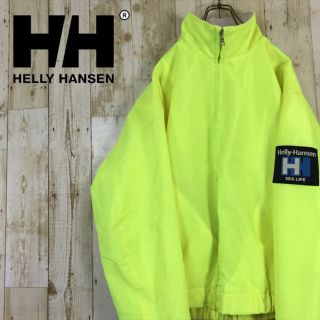 ヘリーハンセン(HELLY HANSEN)のヘリーハンセン ナイロンジャケット ウインドブレイカー プリントロゴ イエロー(ナイロンジャケット)