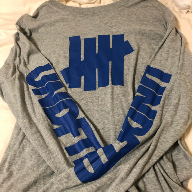 UNDEFEATED(アンディフィーテッド)のUNDEFEATED チャンピオンコラボ ロンT メンズのトップス(Tシャツ/カットソー(七分/長袖))の商品写真