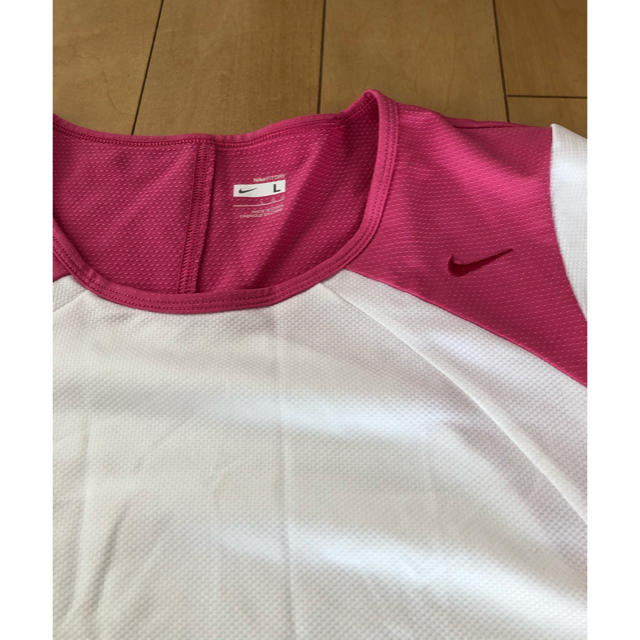 NIKE(ナイキ)のレディーススポーツウェア　　Ｌサイズ レディースのトップス(Tシャツ(半袖/袖なし))の商品写真