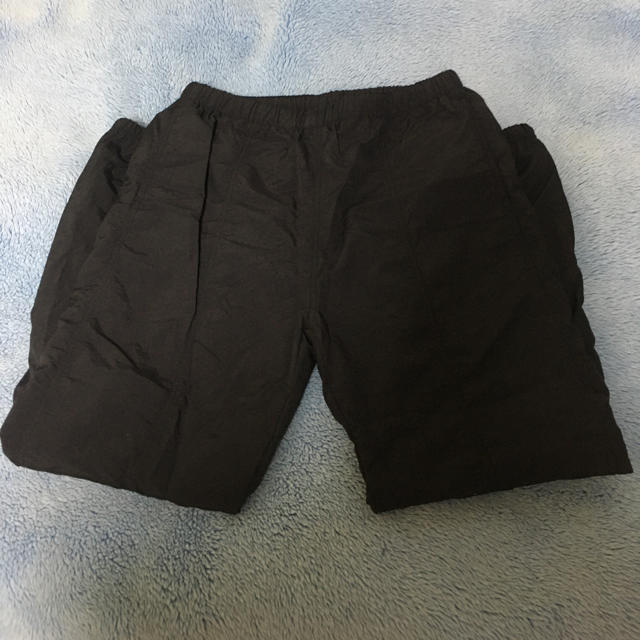 UNDEFEATED(アンディフィーテッド)の中古美品 サイズＭ undefeated warm up pant メンズのパンツ(その他)の商品写真