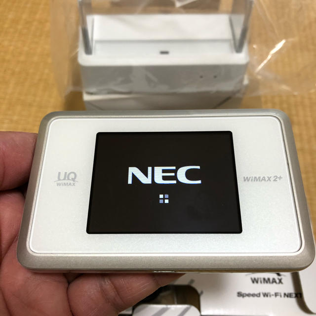 NEC(エヌイーシー)のNEC WX03 ホワイトゴールド、クレードルセット スマホ/家電/カメラのスマートフォン/携帯電話(その他)の商品写真