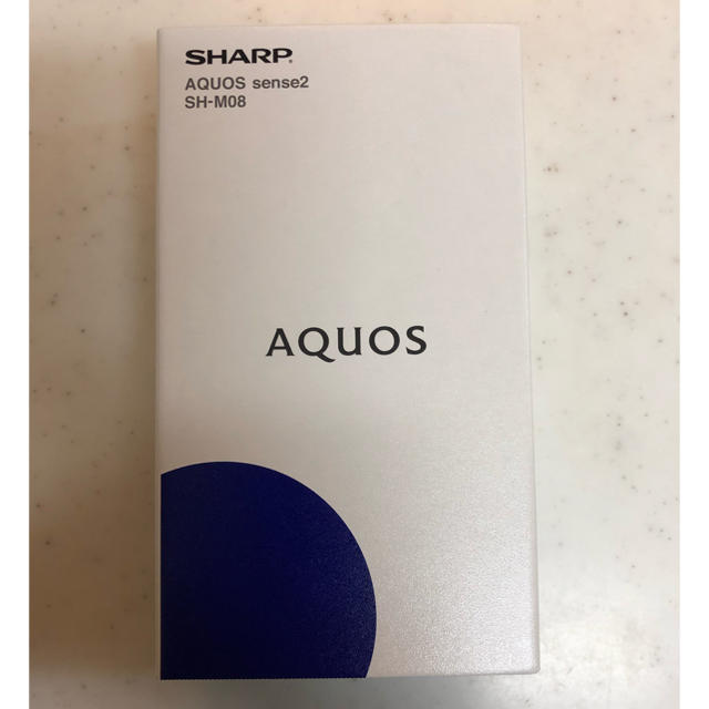 AQUOS(アクオス)のメーカー保証あり　新品未使用　SHARP SH-M08 ホワイト　SIMフリー スマホ/家電/カメラのスマートフォン/携帯電話(スマートフォン本体)の商品写真