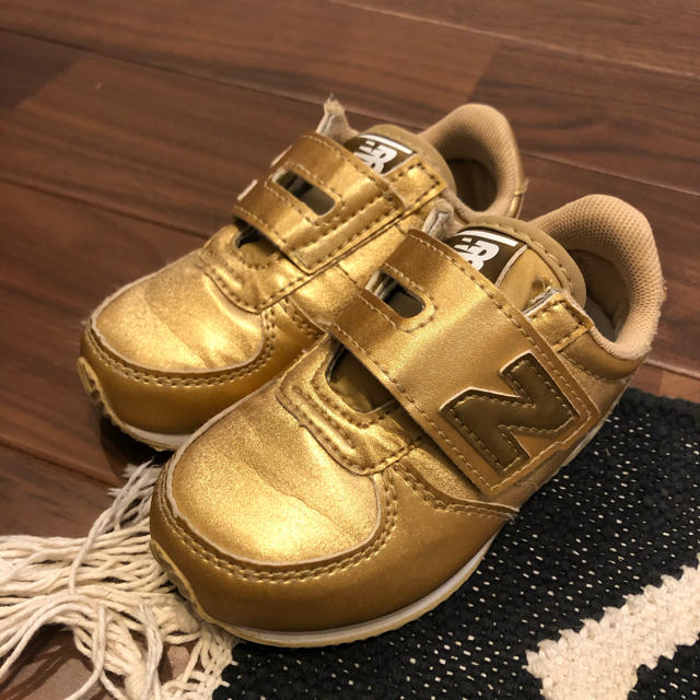 New Balance(ニューバランス)のニューバランス ゴールド 13.5cm キッズ/ベビー/マタニティのベビー靴/シューズ(~14cm)(スニーカー)の商品写真