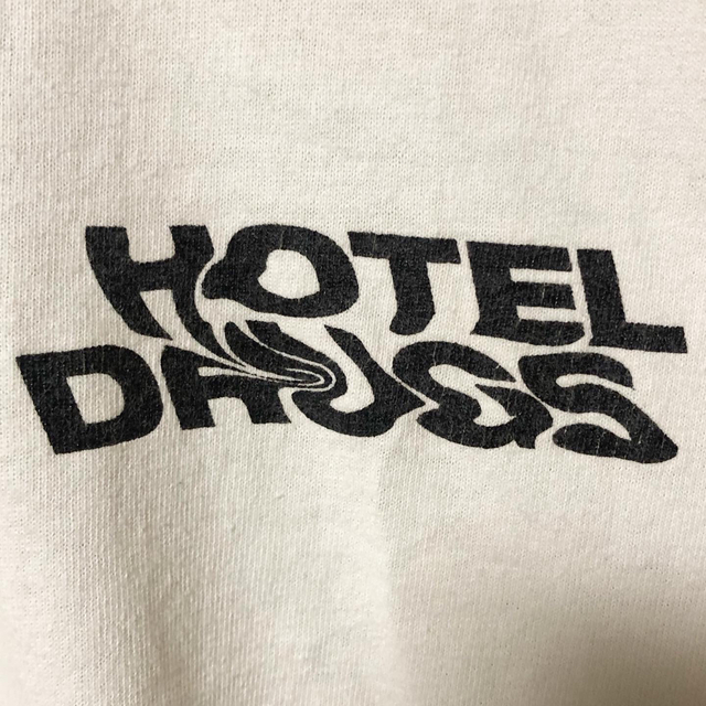 1LDK SELECT(ワンエルディーケーセレクト)のHOTEL DRUGS ボブマーリー SUCKS TEE 白XL 野村訓市 メンズのトップス(Tシャツ/カットソー(半袖/袖なし))の商品写真