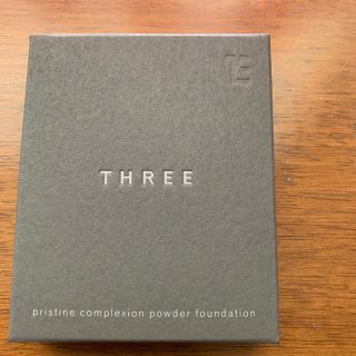 スリー(THREE)のTHREE プリスティーンコンプレクションパウダーファンデーション101新品です(ファンデーション)