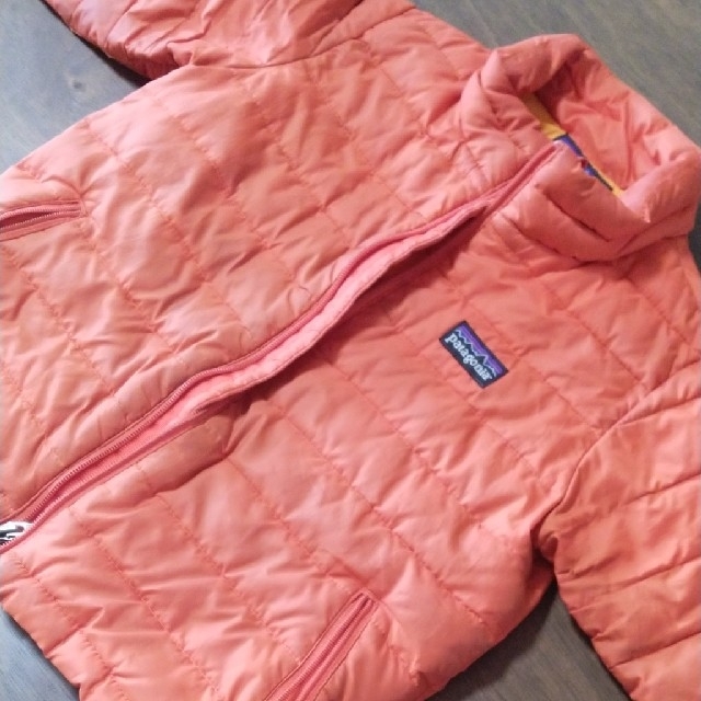 patagonia(パタゴニア)のパタゴニア　キッズ　ダウンジャケット　オレンジ　80cm　中古 キッズ/ベビー/マタニティのベビー服(~85cm)(ジャケット/コート)の商品写真