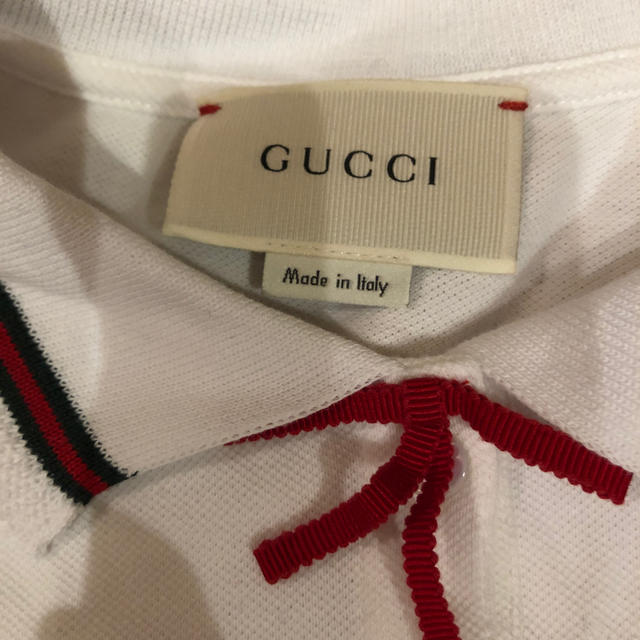 Gucci(グッチ)の公式オンライン購入正規品gucci ポロシャツ　新品未使用 レディースのトップス(ポロシャツ)の商品写真