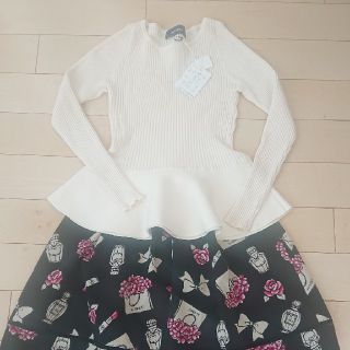 エムズグレイシー(M'S GRACY)の今期❤️バッグリボン🎀のペプラムニット38サイズ(ニット/セーター)