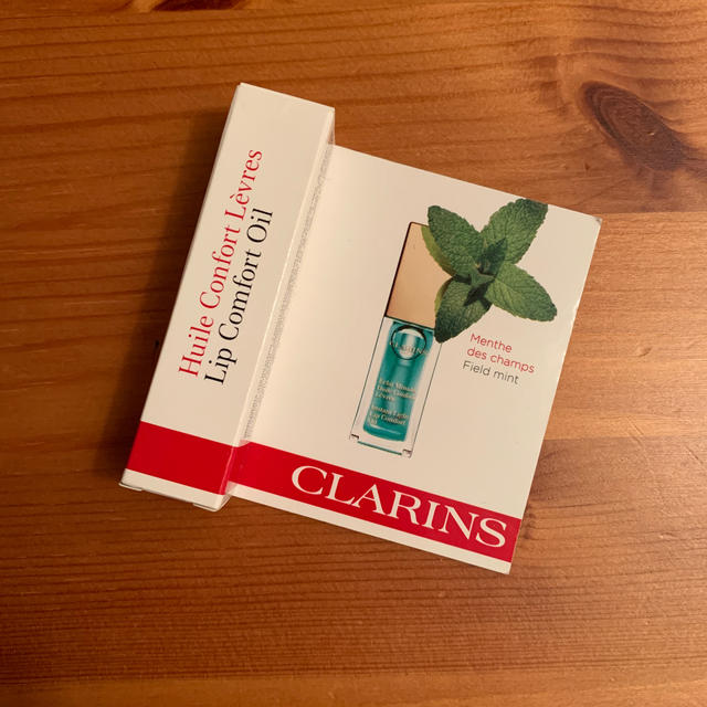 CLARINS(クラランス)のコンフォートリップオイル06ミント コスメ/美容のベースメイク/化粧品(リップグロス)の商品写真