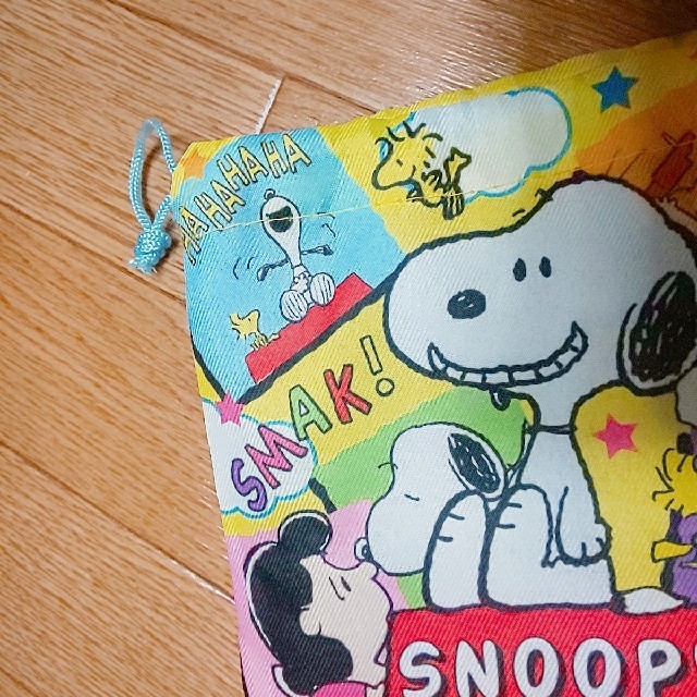 SNOOPY(スヌーピー)のスヌーピー 巾着袋 約15cm×15cm yellow エンタメ/ホビーのおもちゃ/ぬいぐるみ(キャラクターグッズ)の商品写真