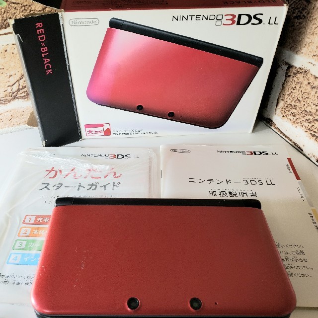 ニンテンドー3DS(ニンテンドー3DS)のNintendo 3DS  LL 本体 レッド/ブラック エンタメ/ホビーのゲームソフト/ゲーム機本体(携帯用ゲーム機本体)の商品写真