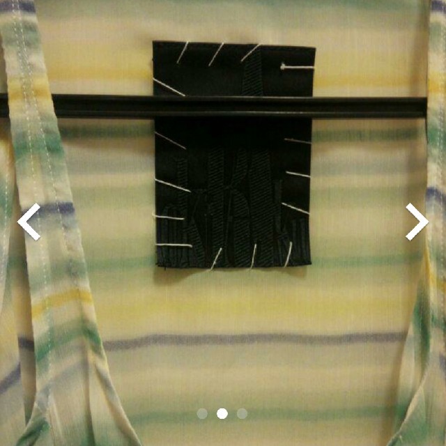 OKIRAKU(オキラク)のOKIRAKU 裾ドレープシャツ レディースのトップス(シャツ/ブラウス(半袖/袖なし))の商品写真