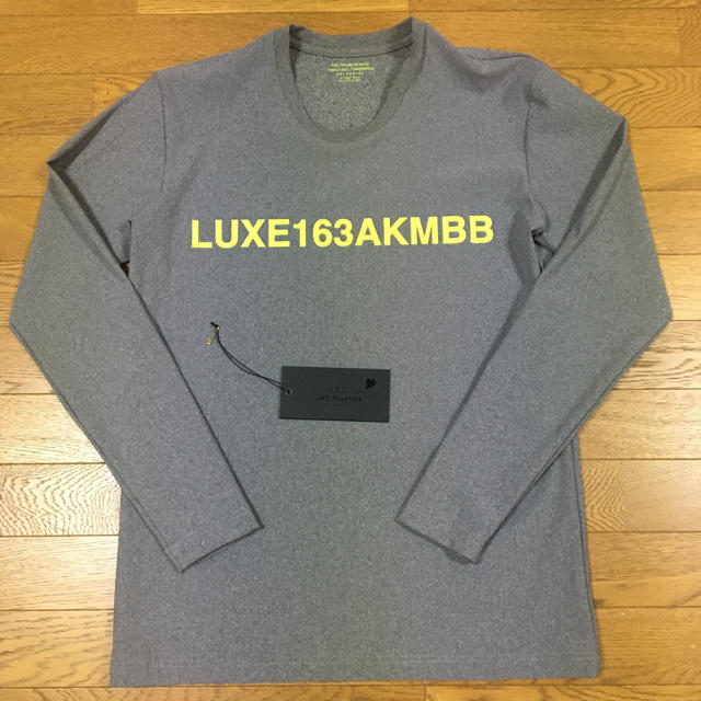 AKM(エイケイエム)の新品 AKM ハイブリッドロゴ長袖Tシャツ ラグスポ 1piu1uguale3 メンズのトップス(Tシャツ/カットソー(七分/長袖))の商品写真