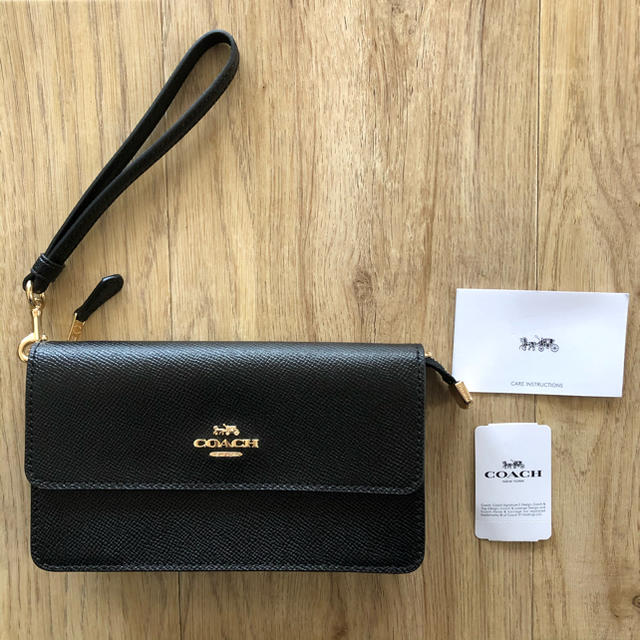 COACH(コーチ)の【coach★新品】黒　クラッチバッグ レディースのバッグ(クラッチバッグ)の商品写真