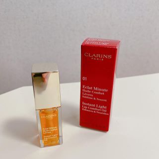 クラランス(CLARINS)の値下げ中！【CLARINS】コンフォート リップオイル 01 ハニー(リップグロス)