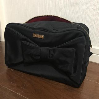 ケイトスペードニューヨーク(kate spade new york)の値下げ中【美品】【ケイトスペード  】大容量 ポーチ ブラック リボン(ポーチ)