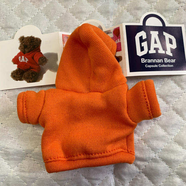 GAP(ギャップ)のGAP ガチャ パーカー オレンジ ① エンタメ/ホビーのおもちゃ/ぬいぐるみ(キャラクターグッズ)の商品写真