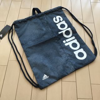 アディダス(adidas)のアディダス　新品未使用タグつき　ナップサック　ネイビー(その他)