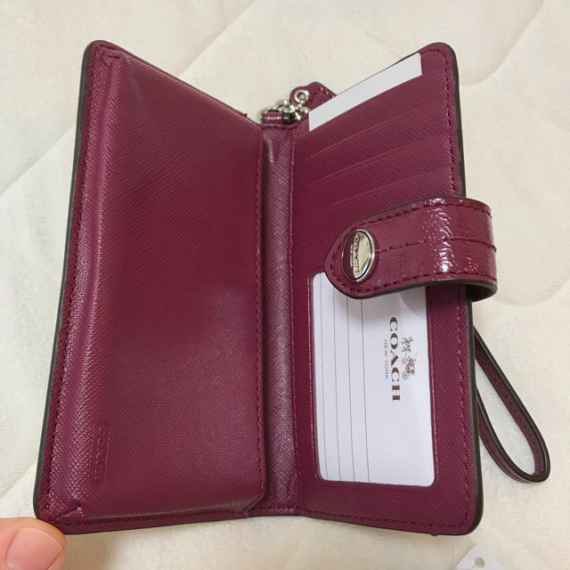 COACH - 新品未使用 コーチ スマホケース 手帳型 パープルの通販 by さきんこ's shop｜コーチならラクマ