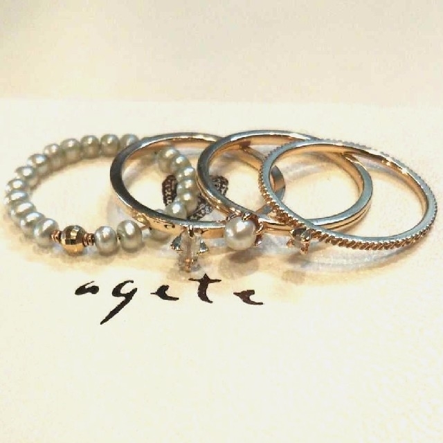 agete(アガット)のアガット K10 パール リング 11号 エタニティ レイヤード 美品 レディースのアクセサリー(リング(指輪))の商品写真