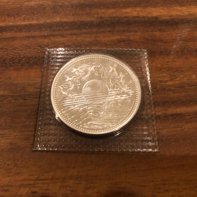 御在位記念硬貨 1万円-