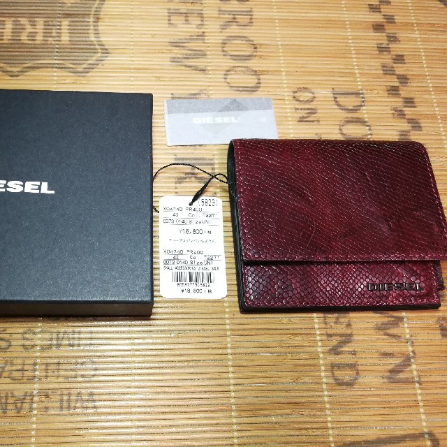 DIESEL(ディーゼル)の【新品・半額以下】ディーゼル　コインケース メンズのファッション小物(コインケース/小銭入れ)の商品写真