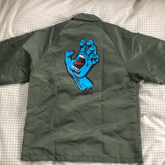 ALPHA INDUSTRIES(アルファインダストリーズ)のサンタクルーズ アルファインダストリーズ コーチジャケット メンズのジャケット/アウター(ミリタリージャケット)の商品写真