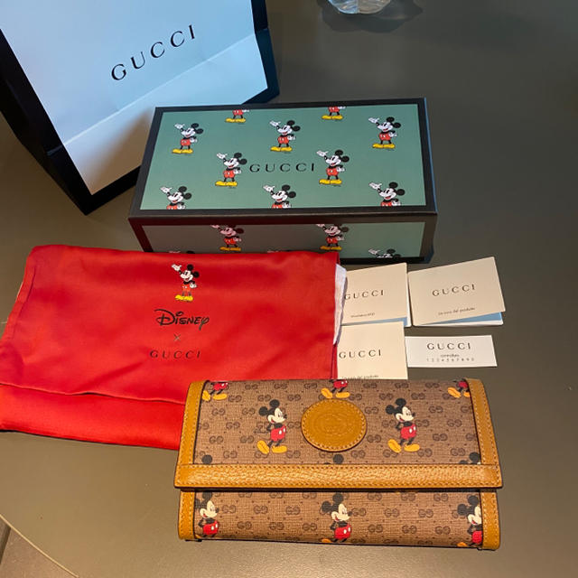 Gucci(グッチ)の【新品未使用】グッチ　x ミッキー  コラボ　フラップ式　長財布　※紙袋・箱付 レディースのファッション小物(財布)の商品写真