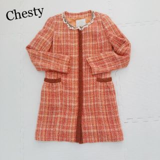 チェスティ(Chesty)のChesty オレンジツイード　ノーカラーコート(ロングコート)