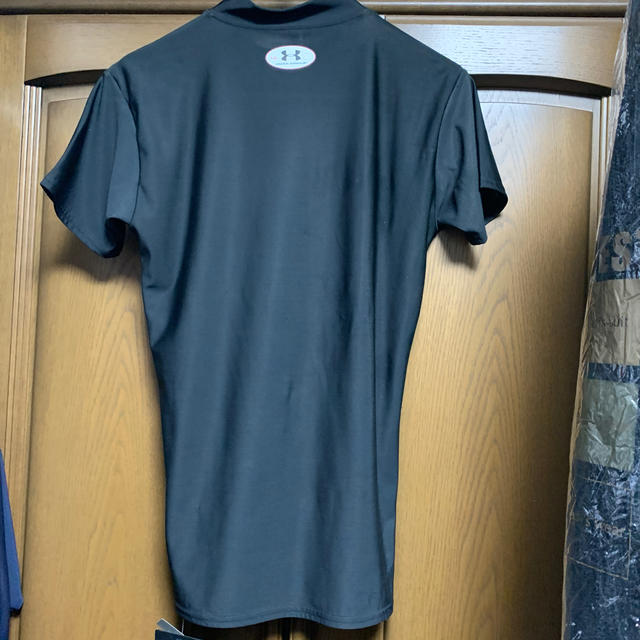 UNDER ARMOUR(アンダーアーマー)のIingーjia様専用アンダーアーマーモックTシャツブラックL G新品 レディースのトップス(Tシャツ(半袖/袖なし))の商品写真