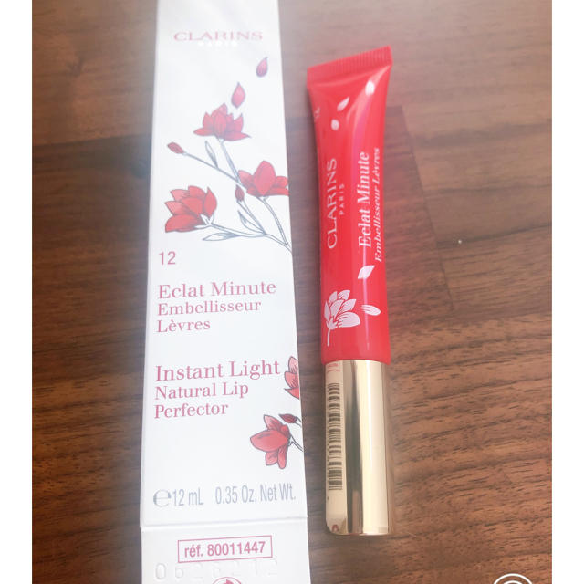 CLARINS(クラランス)のClarins リップグロス　instant light 色No12 値下げ コスメ/美容のベースメイク/化粧品(リップグロス)の商品写真