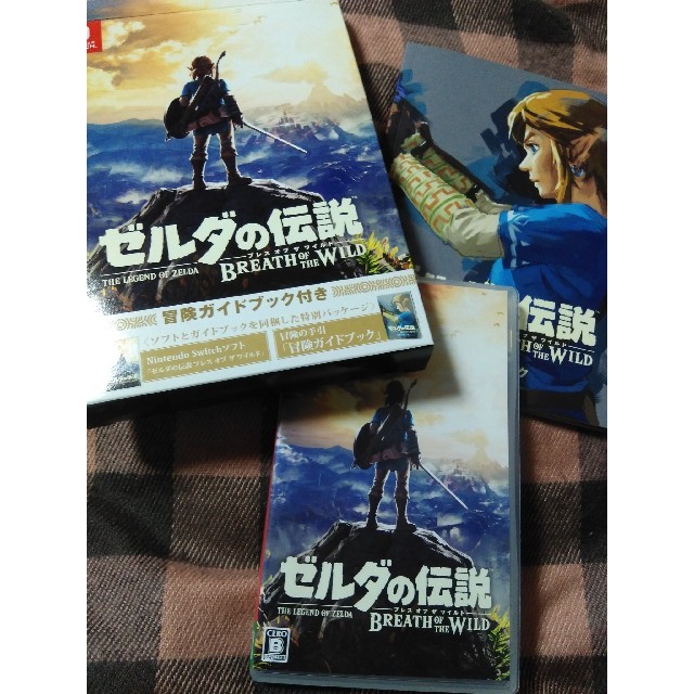 Nintendo Switch(ニンテンドースイッチ)のゼルダの伝説 ブレス オブ ザ ワイルド ～冒険ガイドブック付き～ エンタメ/ホビーのゲームソフト/ゲーム機本体(家庭用ゲームソフト)の商品写真