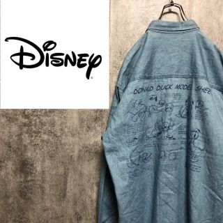 ディズニー(Disney)の【激レア】ディズニー☆ドナルドバックプリント・キャラ刺繍ロゴデニムシャツ 90s(シャツ)