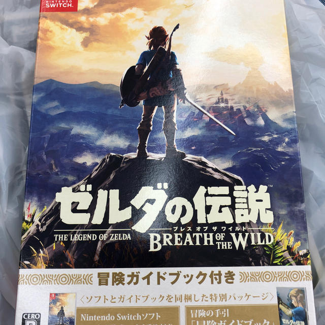 Nintendo Switch(ニンテンドースイッチ)の新品　ゼルダの伝説 ブレス オブ ザ ワイルド ～冒険ガイドブック＆マップ付き～ エンタメ/ホビーのゲームソフト/ゲーム機本体(家庭用ゲームソフト)の商品写真