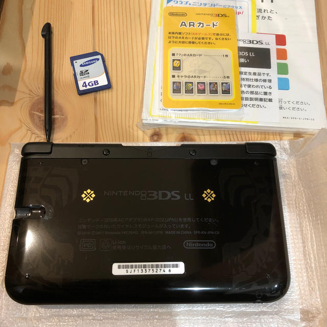 ニンテンドー3DS(ニンテンドー3DS)のモンスターハンター4 スペシャルパック（ゴア・マガラブラック）/3DS/SPRS エンタメ/ホビーのゲームソフト/ゲーム機本体(携帯用ゲーム機本体)の商品写真