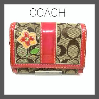 コーチ(COACH)のCOACH コーチ　花　エナメル　モノグラム　折り財布　財布　ピンク(財布)