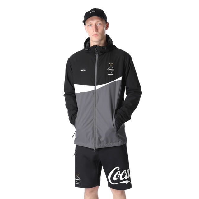 F.C.R.B.(エフシーアールビー)のF.C.R.B COCA-COLA WARM UP JACKET 未使用 L メンズのジャケット/アウター(ナイロンジャケット)の商品写真