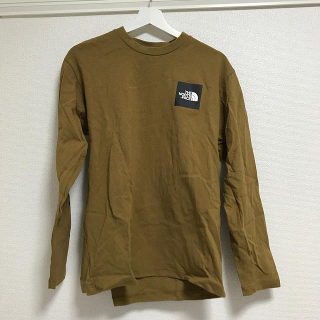 THE NORTH FACE(ザノースフェイス)のノースフェイス　スクエアロゴロンT ワイマラナーブラウン メンズのトップス(Tシャツ/カットソー(七分/長袖))の商品写真