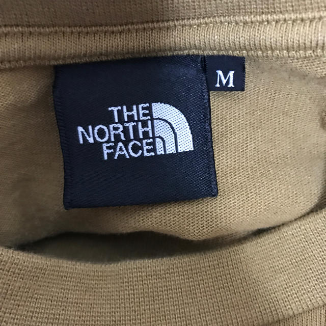 THE NORTH FACE(ザノースフェイス)のノースフェイス　スクエアロゴロンT ワイマラナーブラウン メンズのトップス(Tシャツ/カットソー(七分/長袖))の商品写真